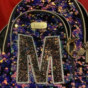 M multicolored justice shimmery bag